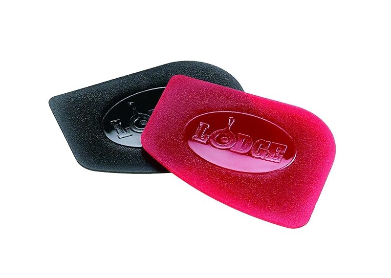 Two Lodge pan scrapers, one red and one black